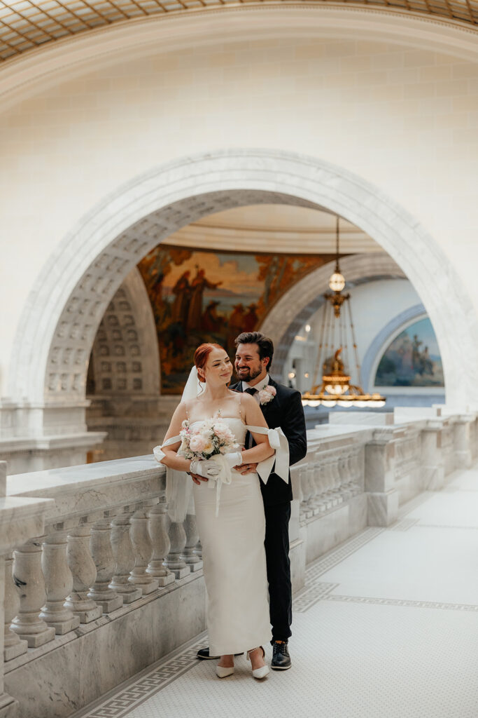 Bride and groom in the rotunda of the Utah State Capitol 