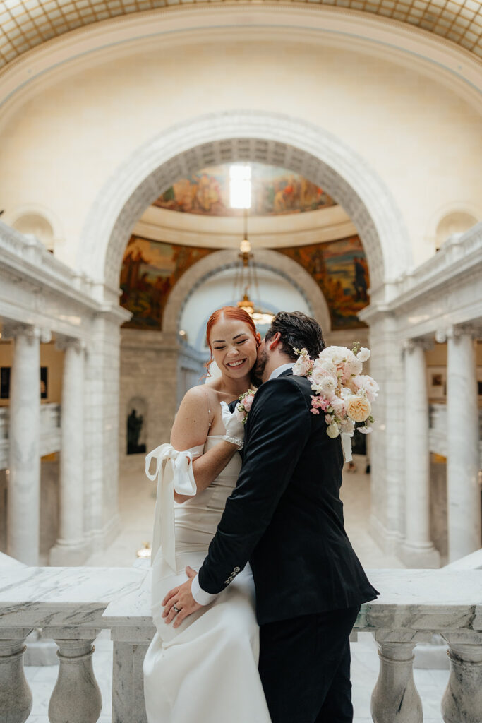 Bride and groom in the rotunda of the Utah State Capitol 